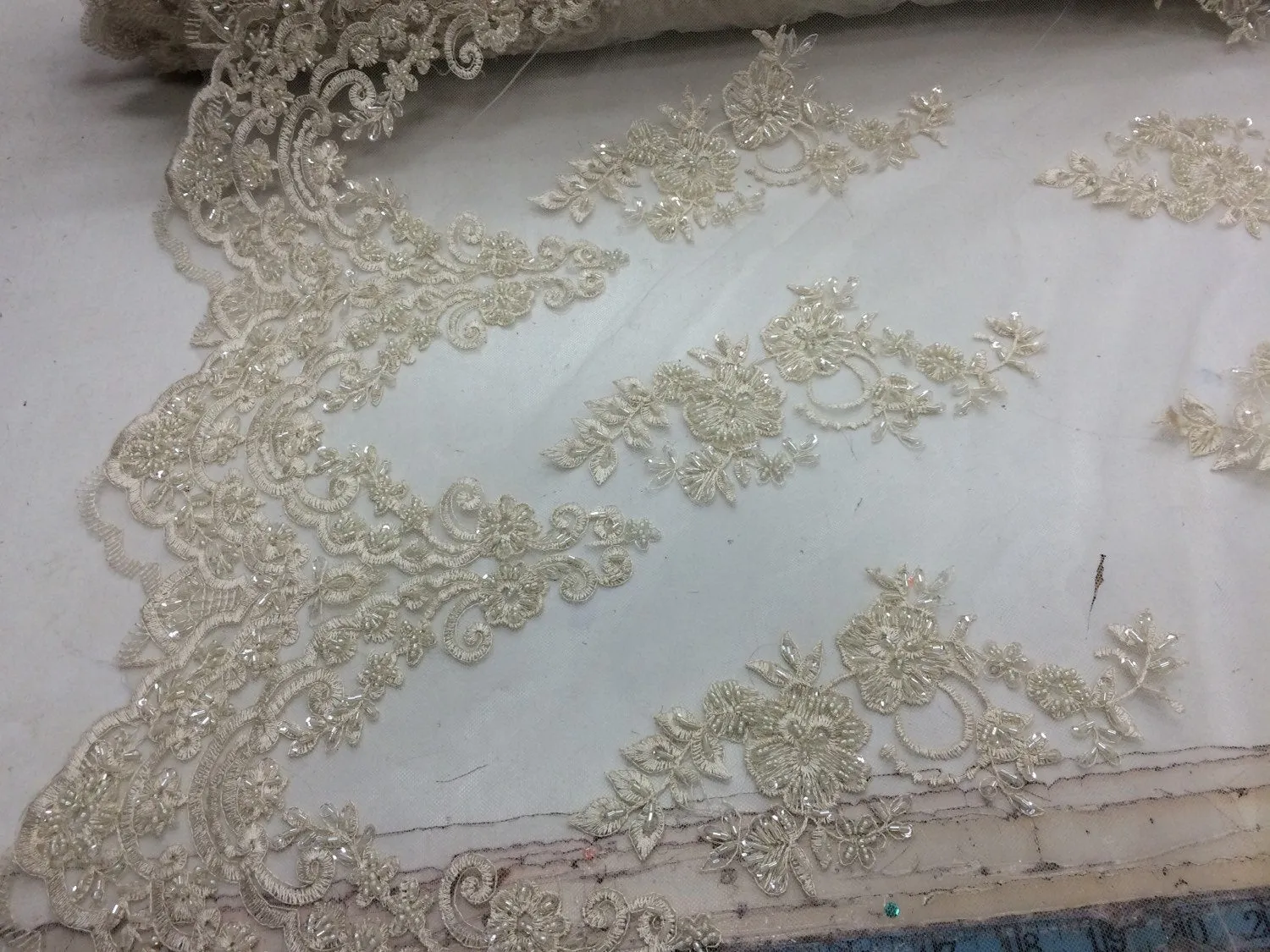 Elegant ivory hand beaded mesh lace. Wedding/Bridal-prom-nightgown fabric lace.36x50inches. Sold by the yard.