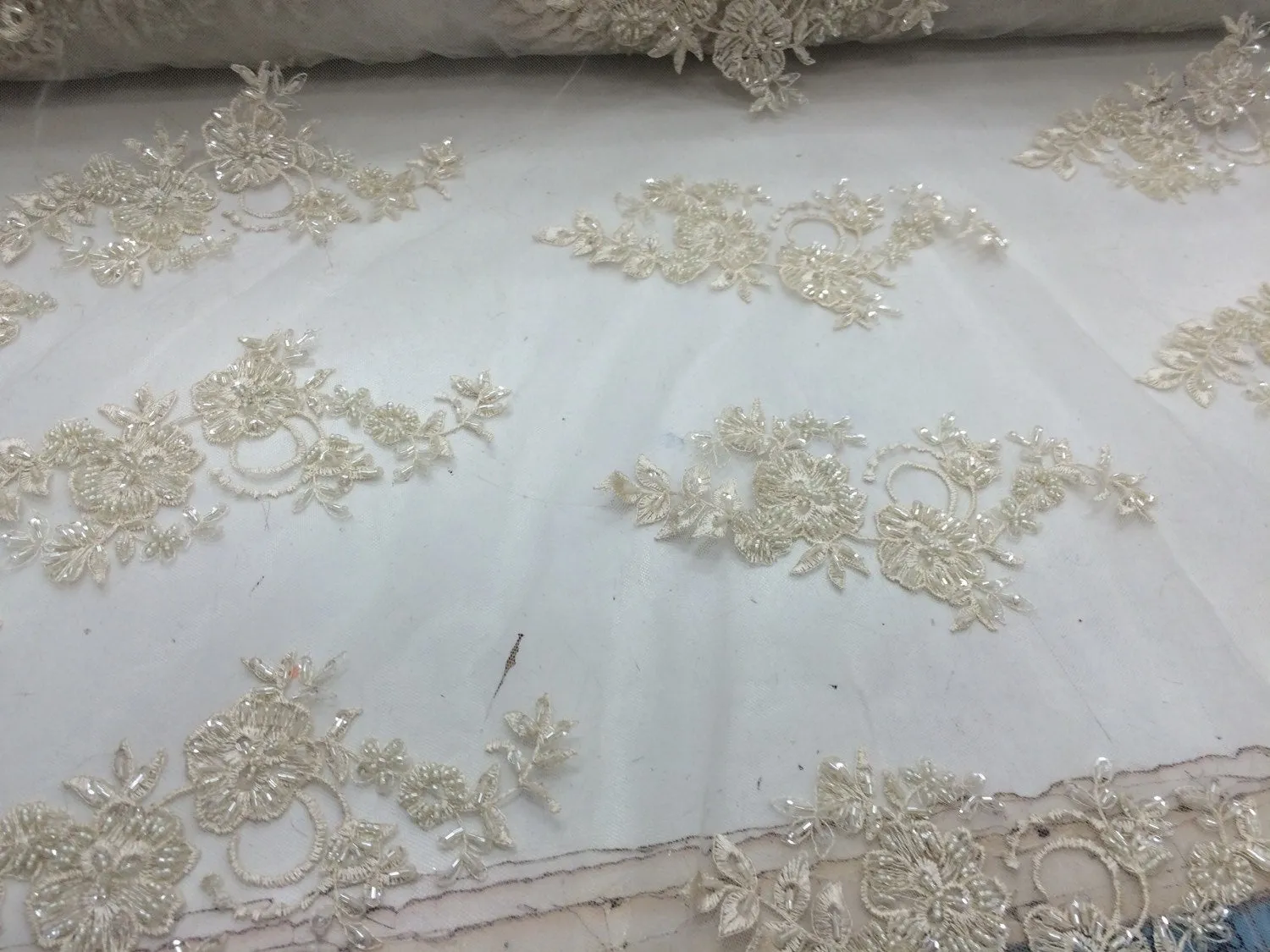 Elegant ivory hand beaded mesh lace. Wedding/Bridal-prom-nightgown fabric lace.36x50inches. Sold by the yard.