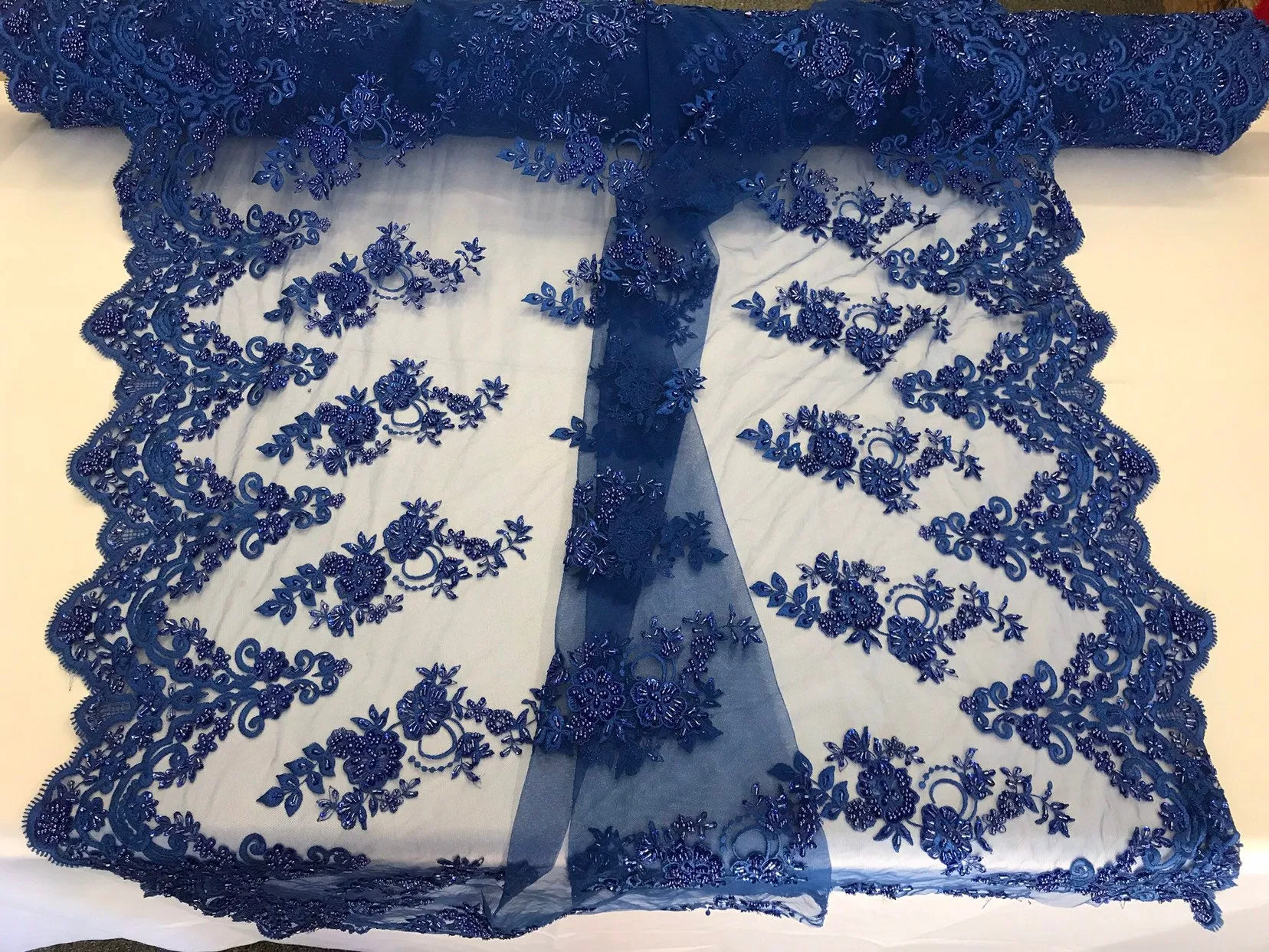 Royal blue hand beaded floral design embroidery with shiny sequins on a mesh lace-dresses-apparel-fashion-prom-nightgown-sold by the yard.