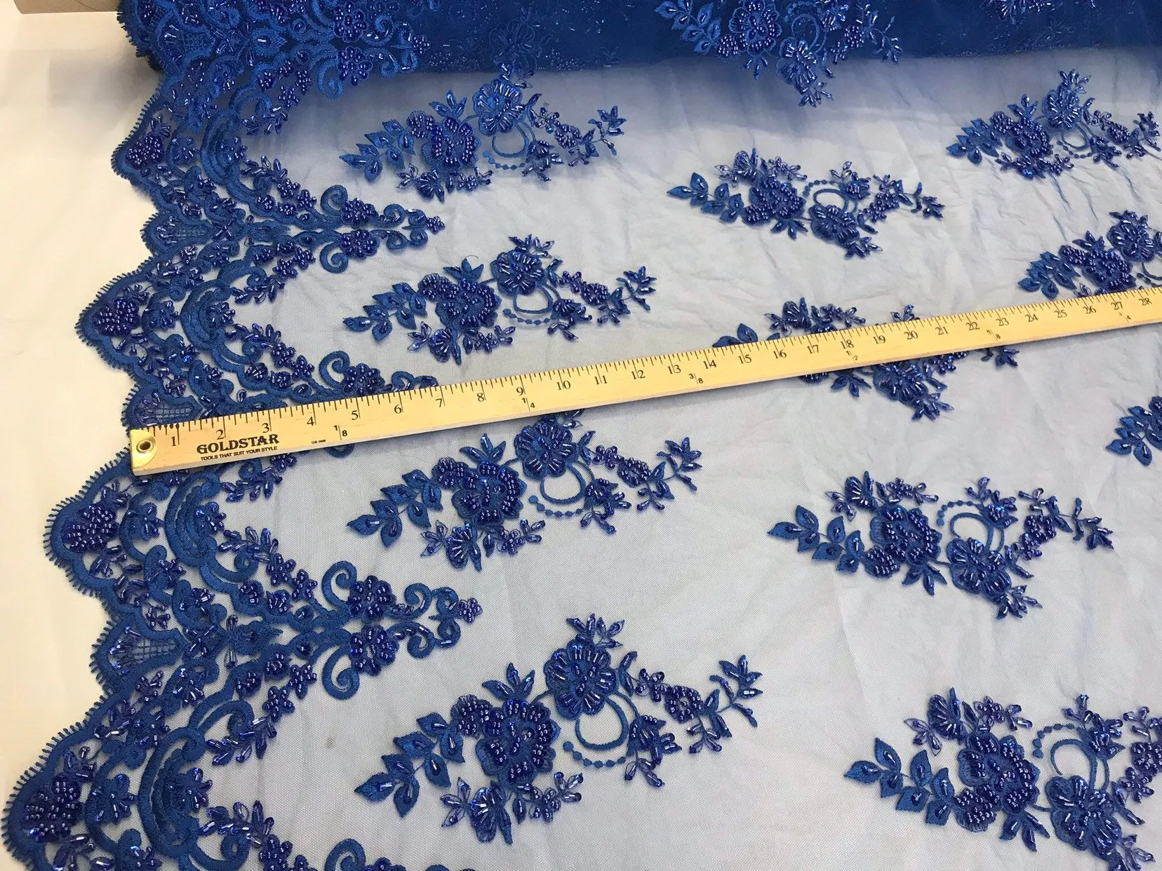 Royal blue hand beaded floral design embroidery with shiny sequins on a mesh lace-dresses-apparel-fashion-prom-nightgown-sold by the yard.